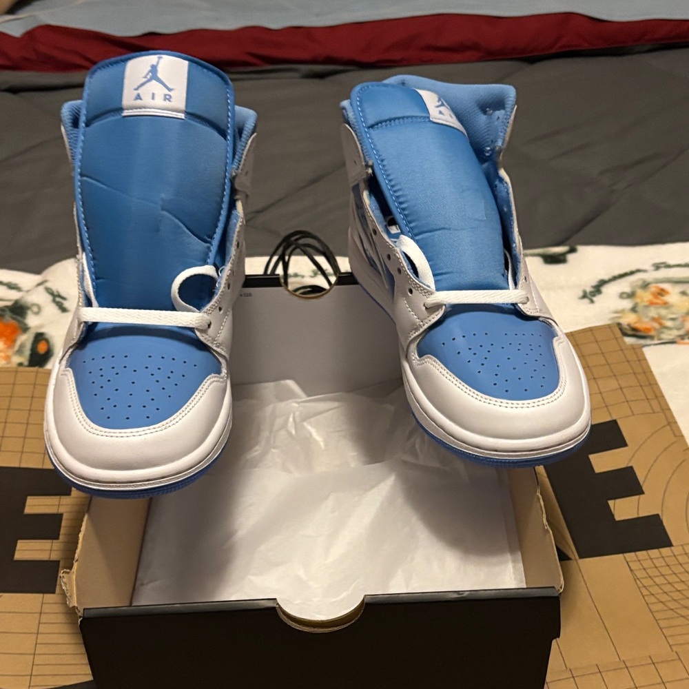 Jordan Men's Blue and White Athletic Shoes also have sizes 9.5 and 12